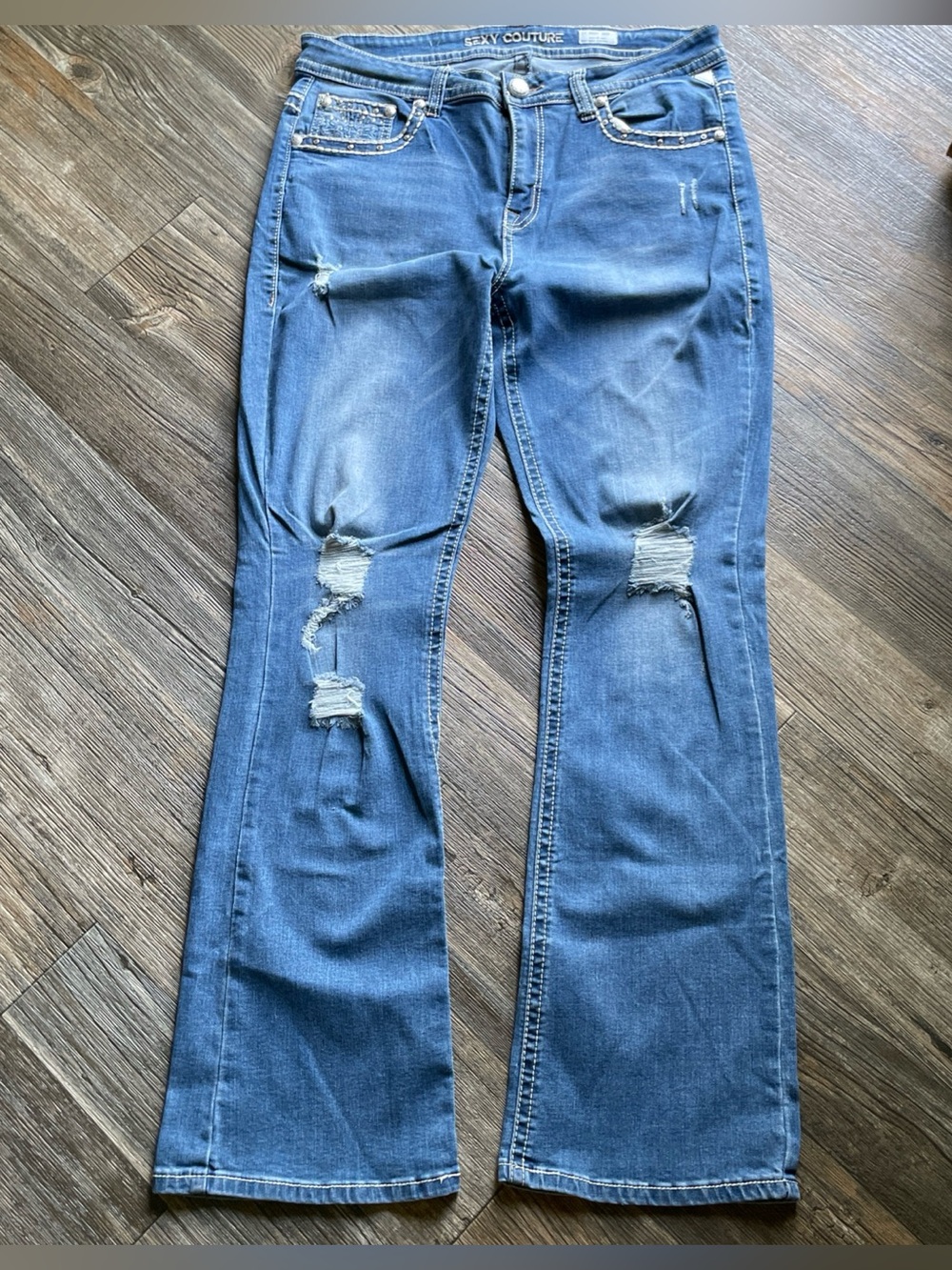 Women's Distressed Blue Jeans